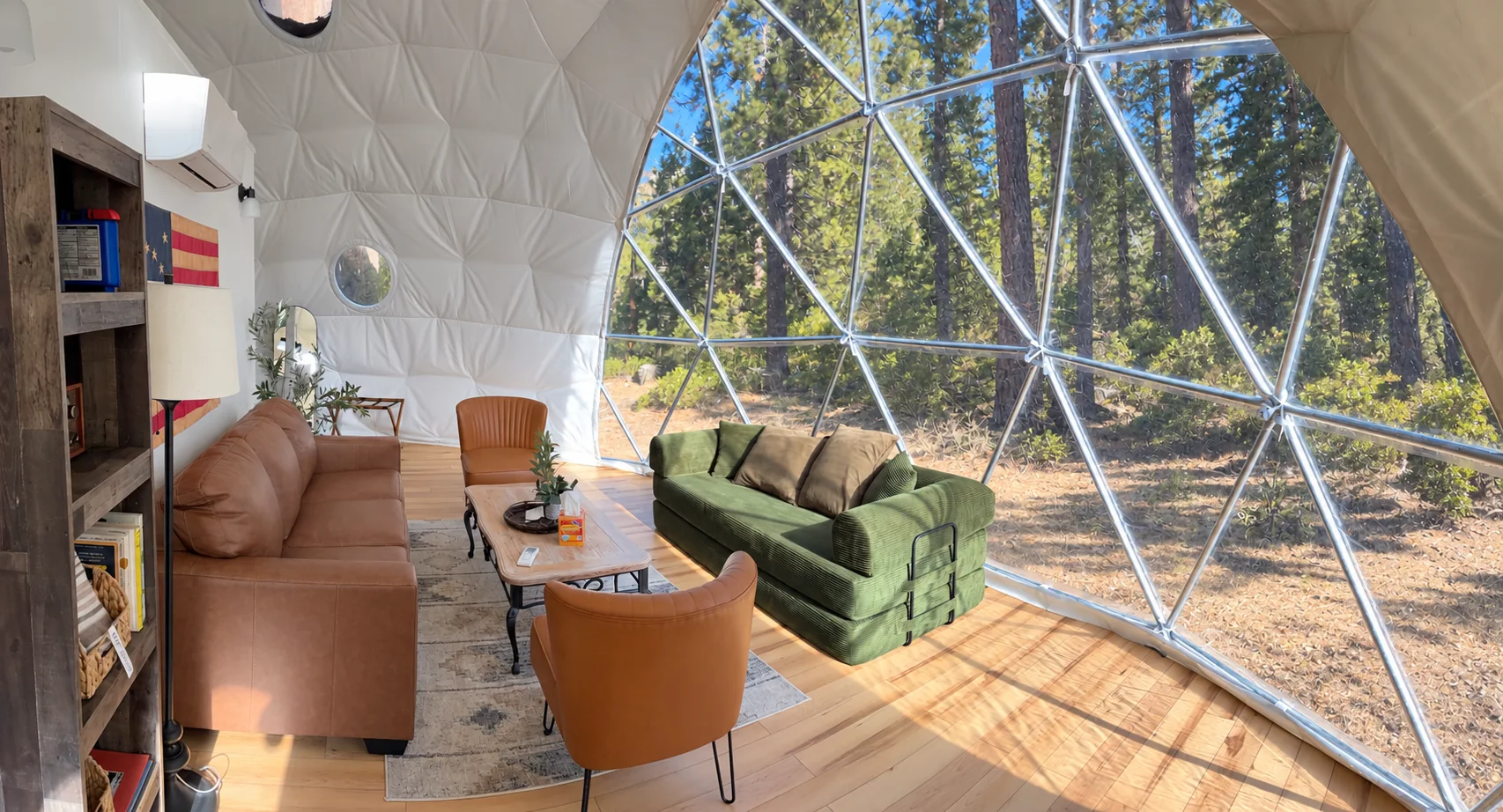 Wide view of the living area through the geodesic dome interior