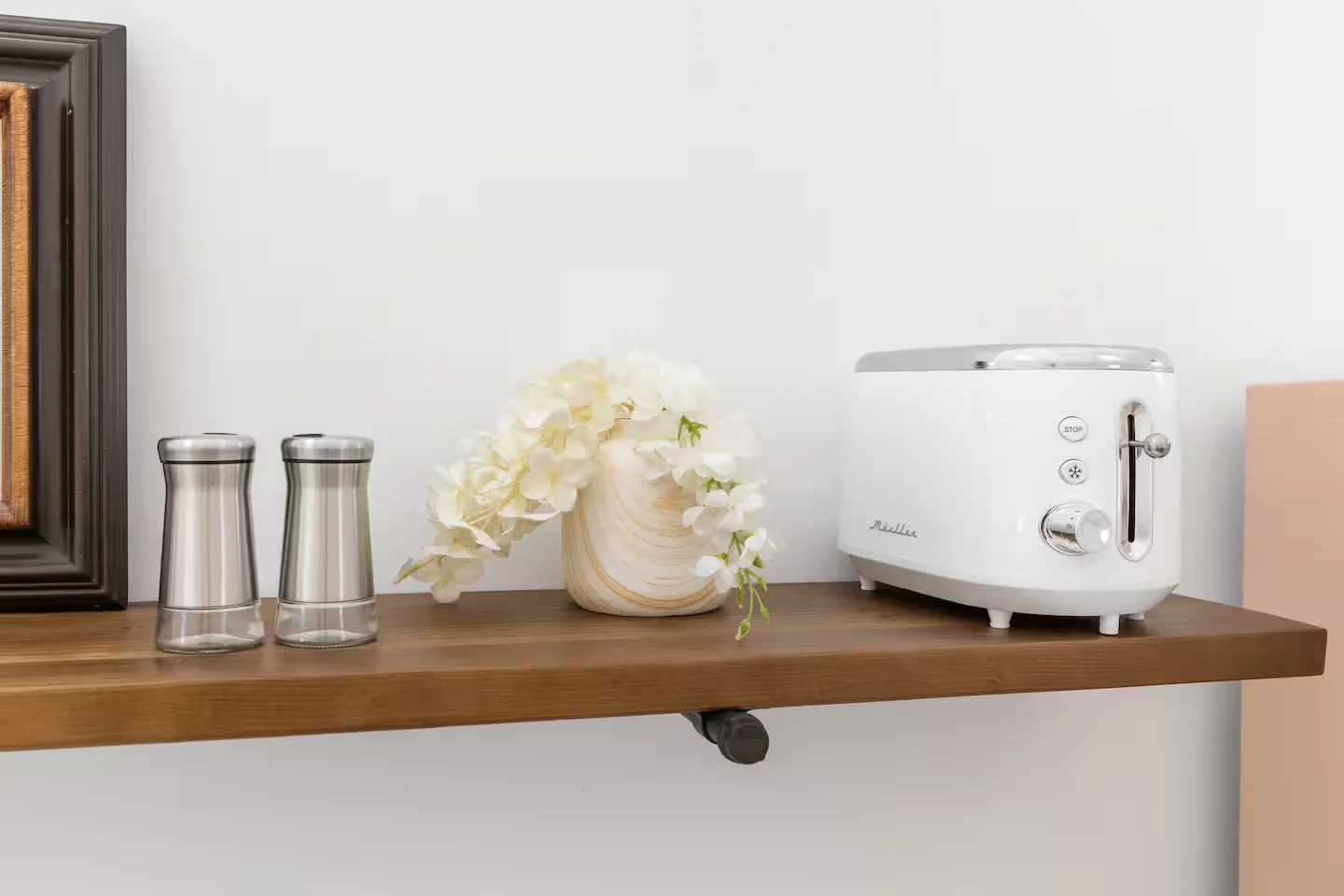 Kitchen shelf with toaster and small essentials
